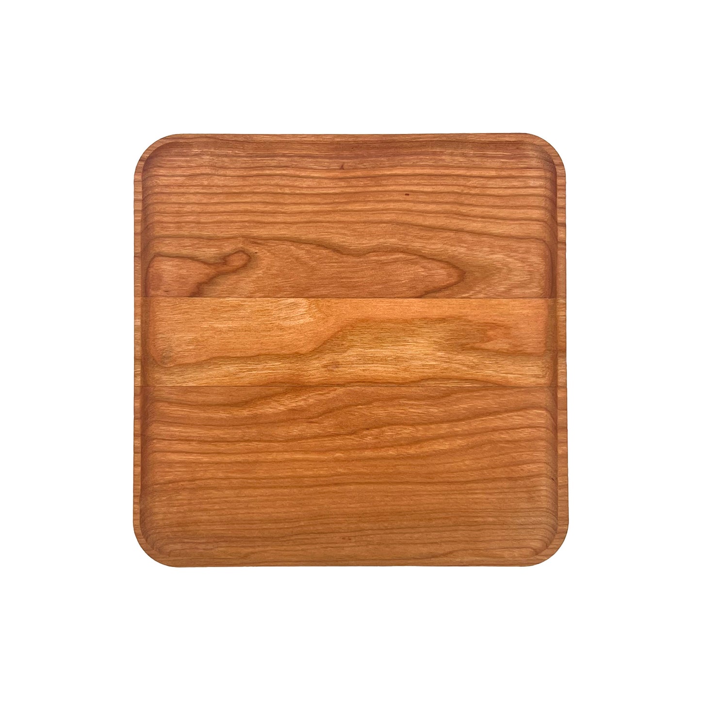 Wooden cutting board on a white background