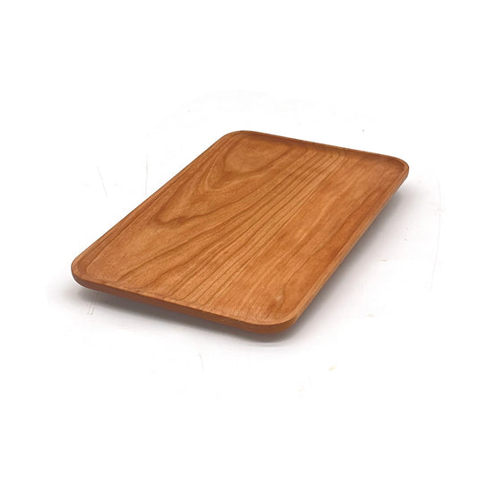 Angled view of a cherry 9"x 5.5" appetizer plate on a white background.