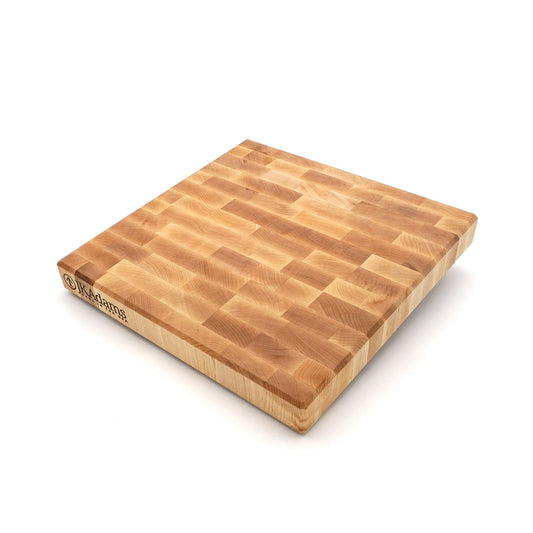 A square wooden cutting board made from natural wood blocks, shown at an angle on a white background. The brand name 'WOODZONE' is visible on the left edge.