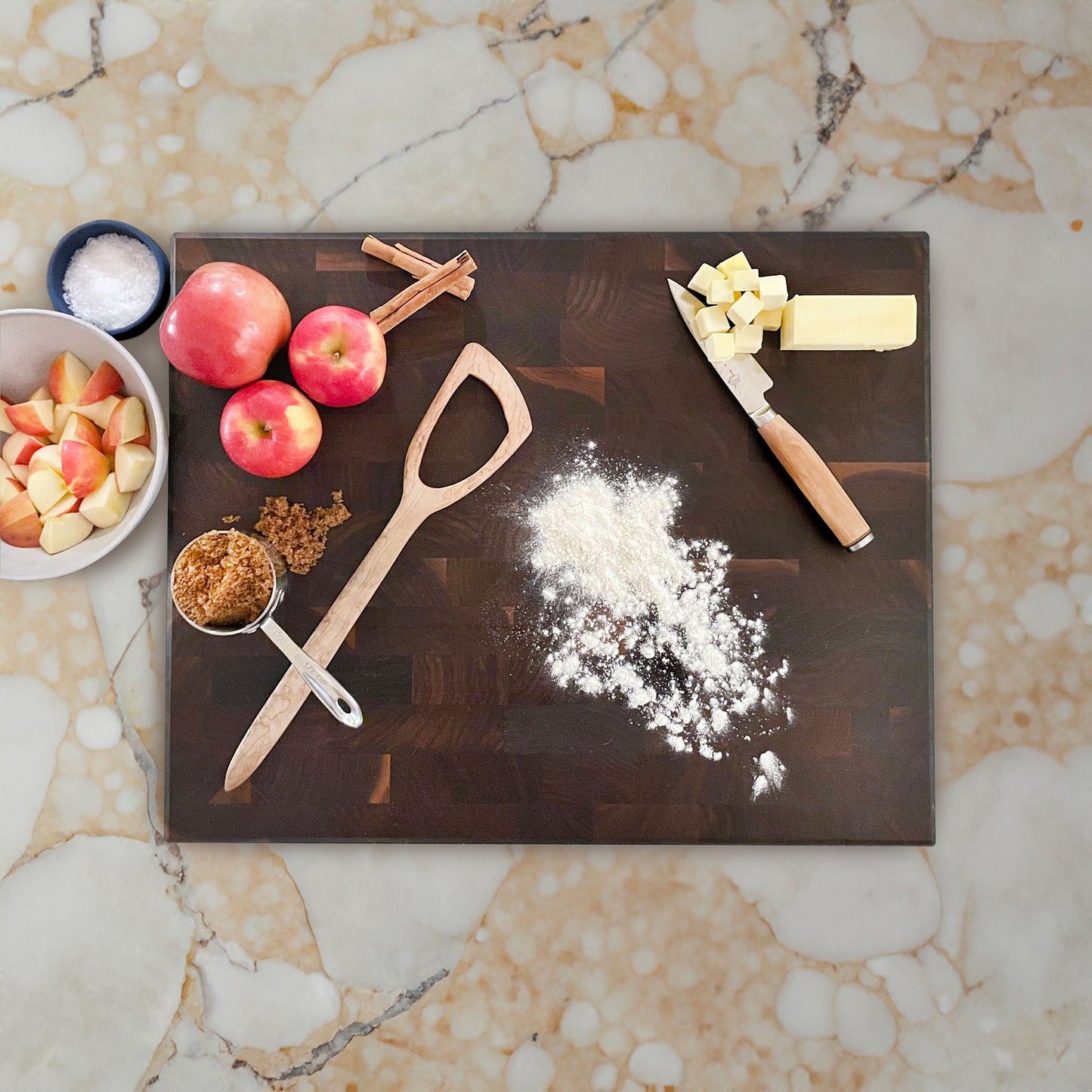 JK Adams Professional Walnut End Grain Cutting Board 20x16 prepping apple pie with flour, butter, brown sugar and apples