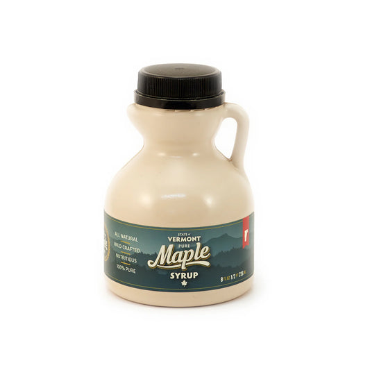 1/2 PINT PLASTIC JUG OF PURE VERMONT MAPLE SYRUP.