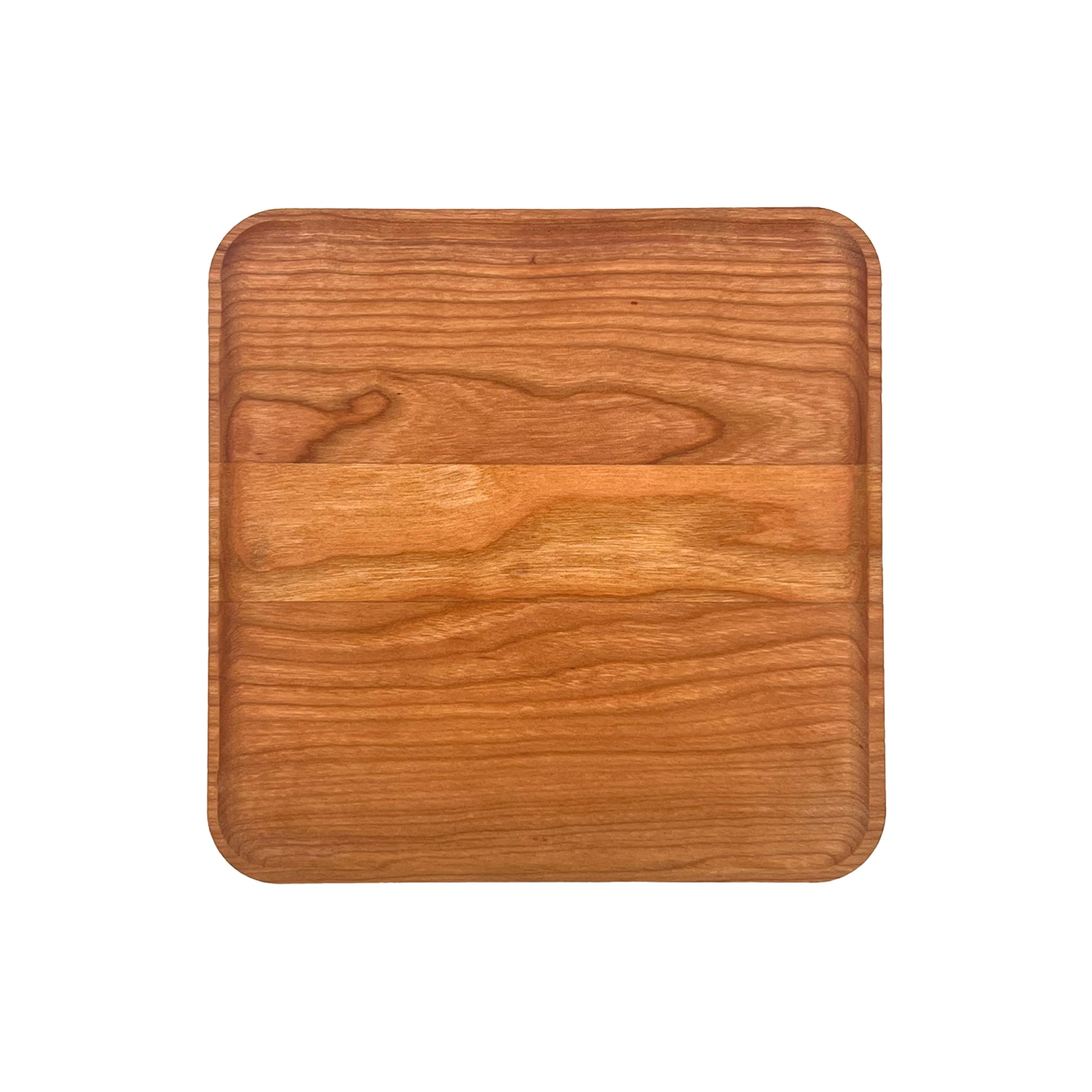 Wooden cutting board on a white background