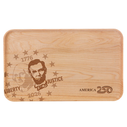 Wooden cutting board with engraved text and images of Washington and Lincoln on a white background