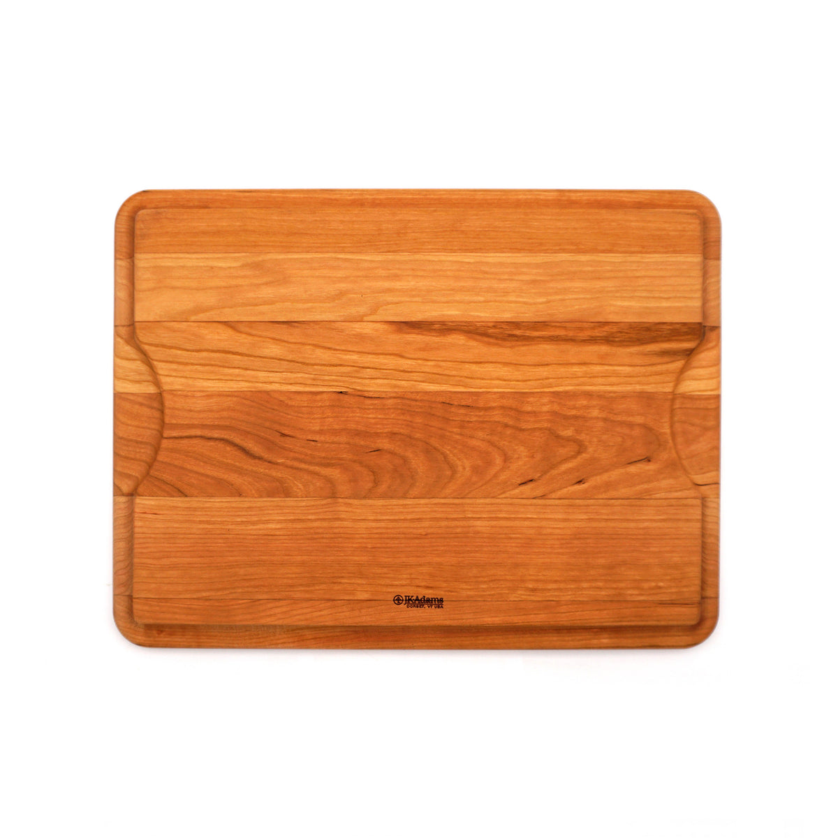 A rectangular wooden cutting board with rounded corners and a small black Kipsta logo near the bottom center, shown on a plain white background.