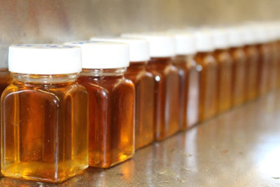 Jars of maple syrup